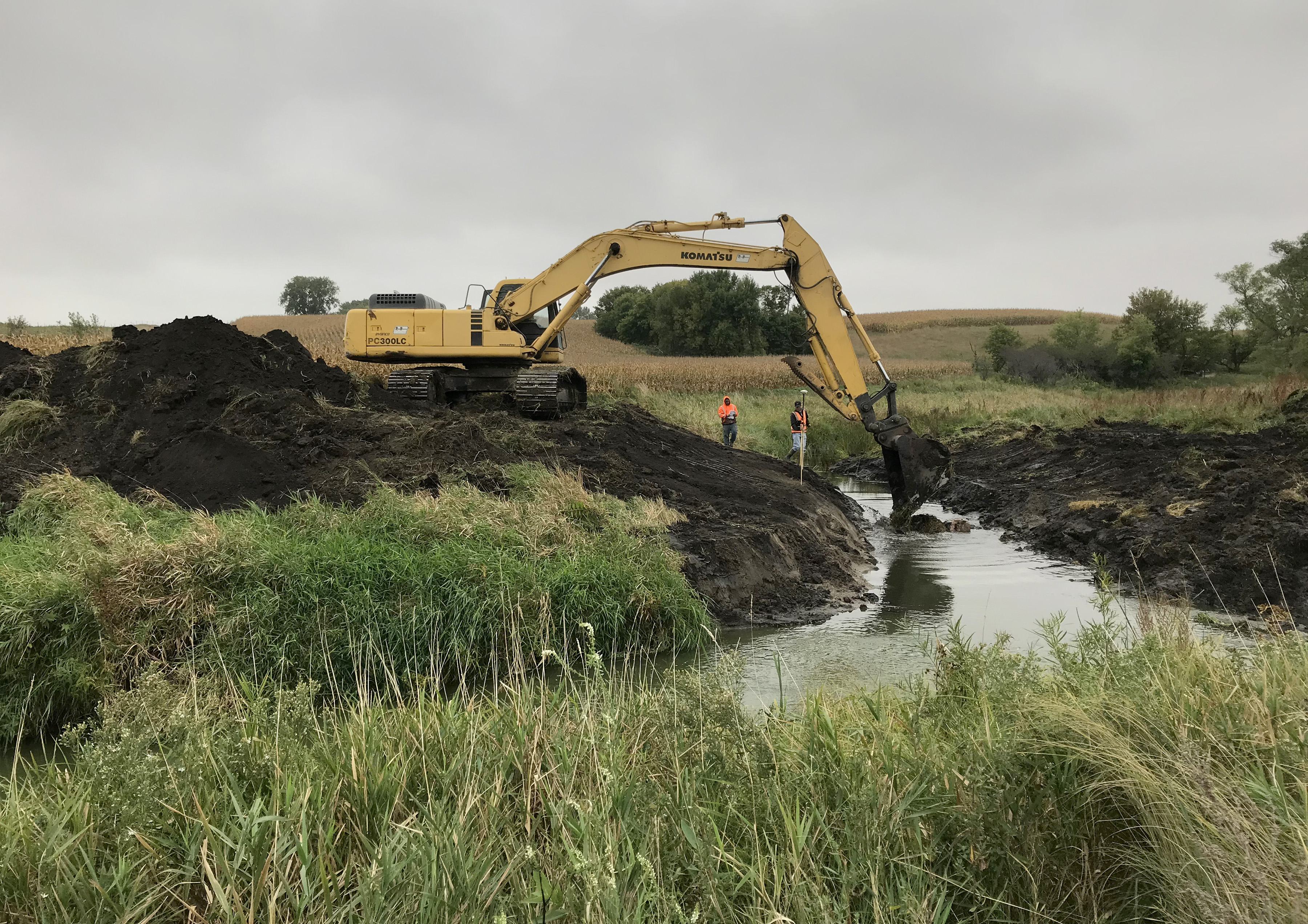 crane excavating stream