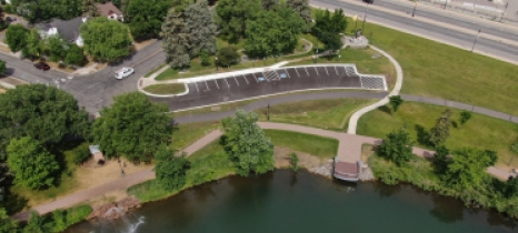 Aerial view of lake's edge and parking lot where underground project was installed
