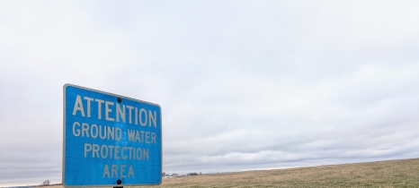 sign in front of field