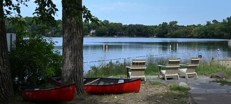 a canoe  near the shoreline of a lake