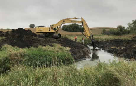 crane excavating stream