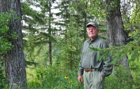 Man standing in woods