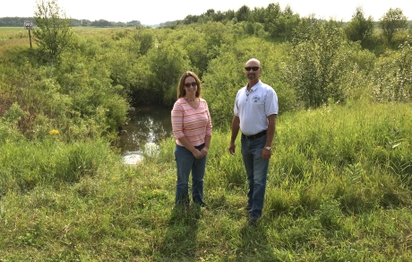 Lake of the Woods SWCD and County staff stand in front of a segment of Judicial Ditch 28 before construction began